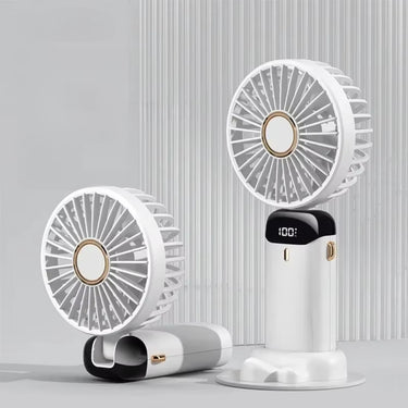 Ventilateur de poche portable blanc, rechargeable via USB, avec écran LED et socle détachable, compact et pratique pour une utilisation quotidienne.